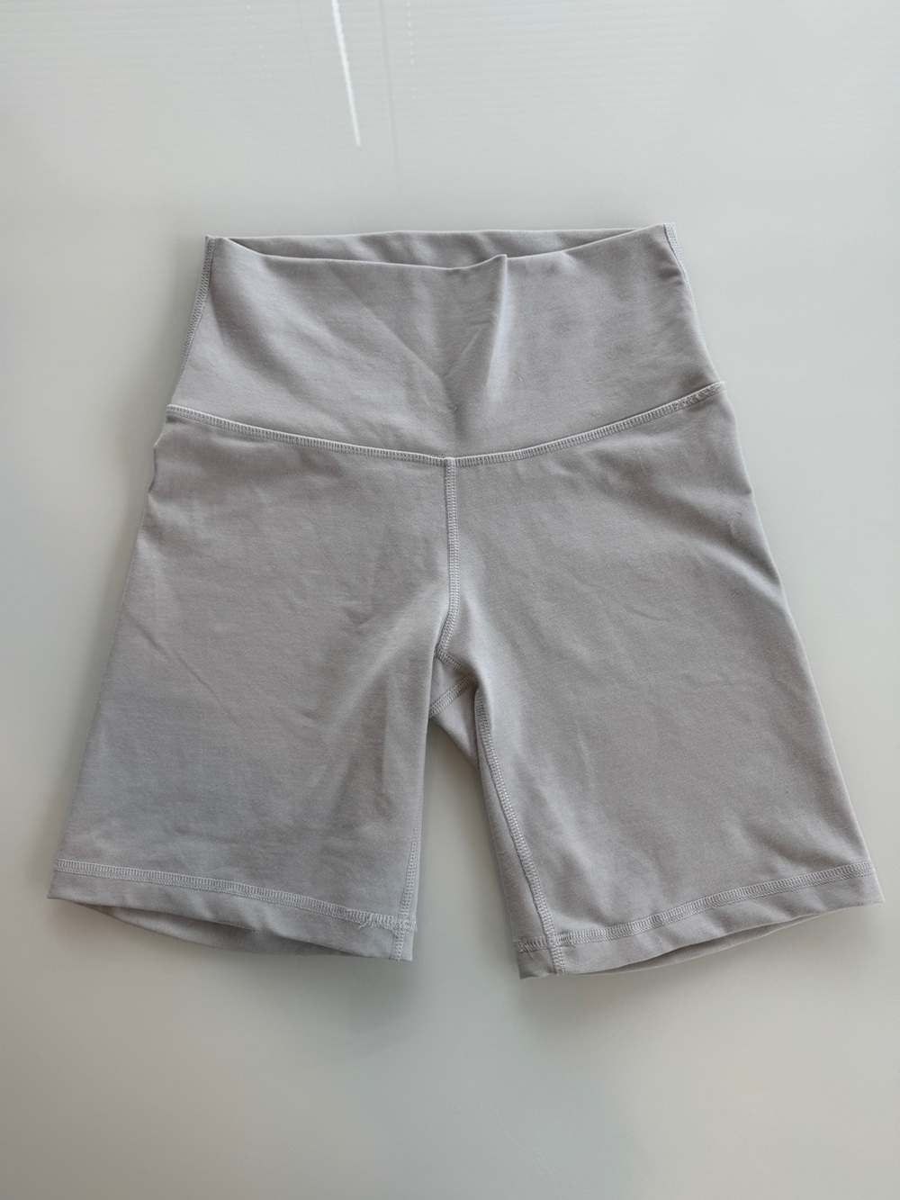 TNA Women's High-Rise Bike Shorts in Light Gray